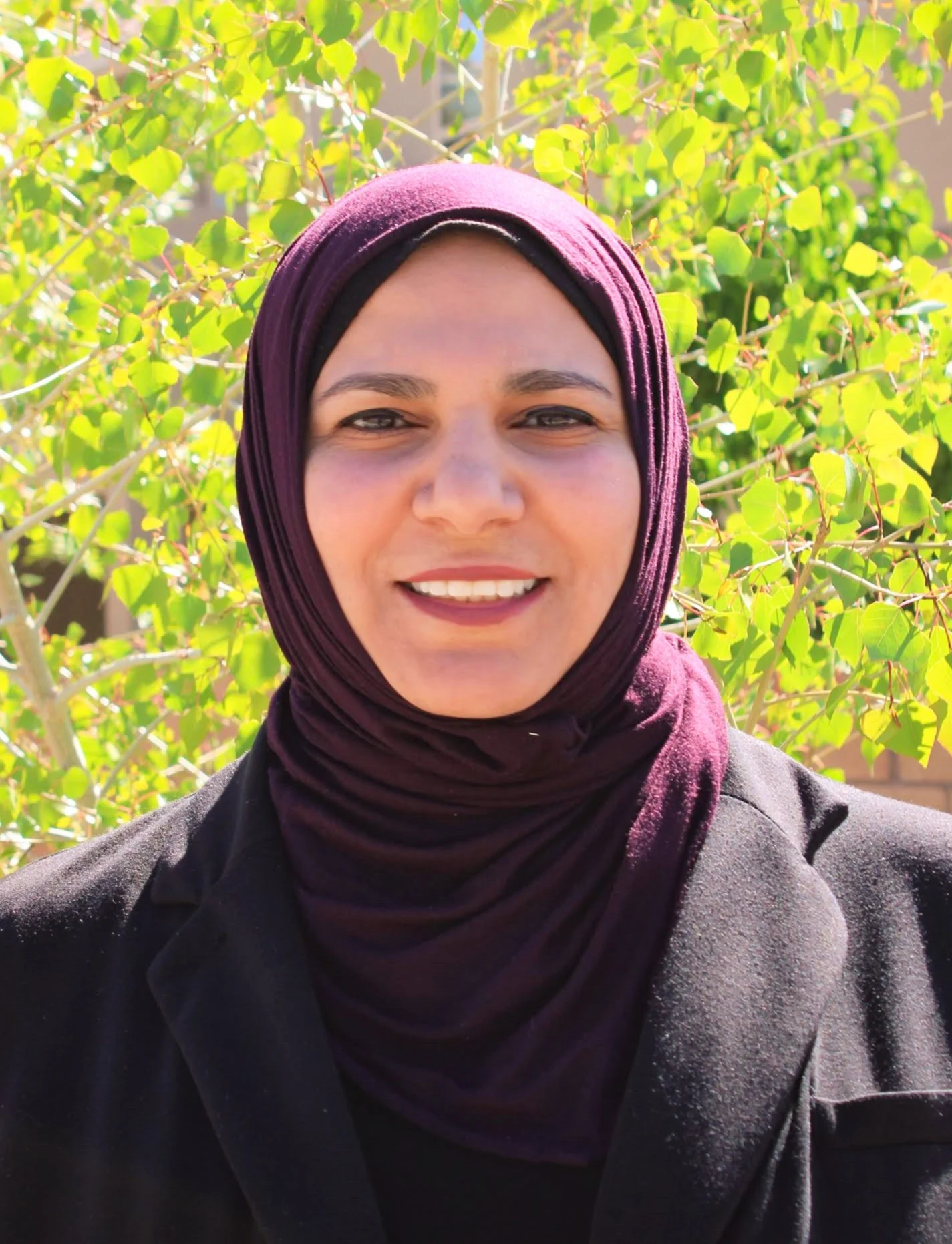 Headshot of Asmaa Mohamed, LPC-Associate