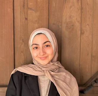 Headshot of Tasneem Alhomsy, LPC-Associate